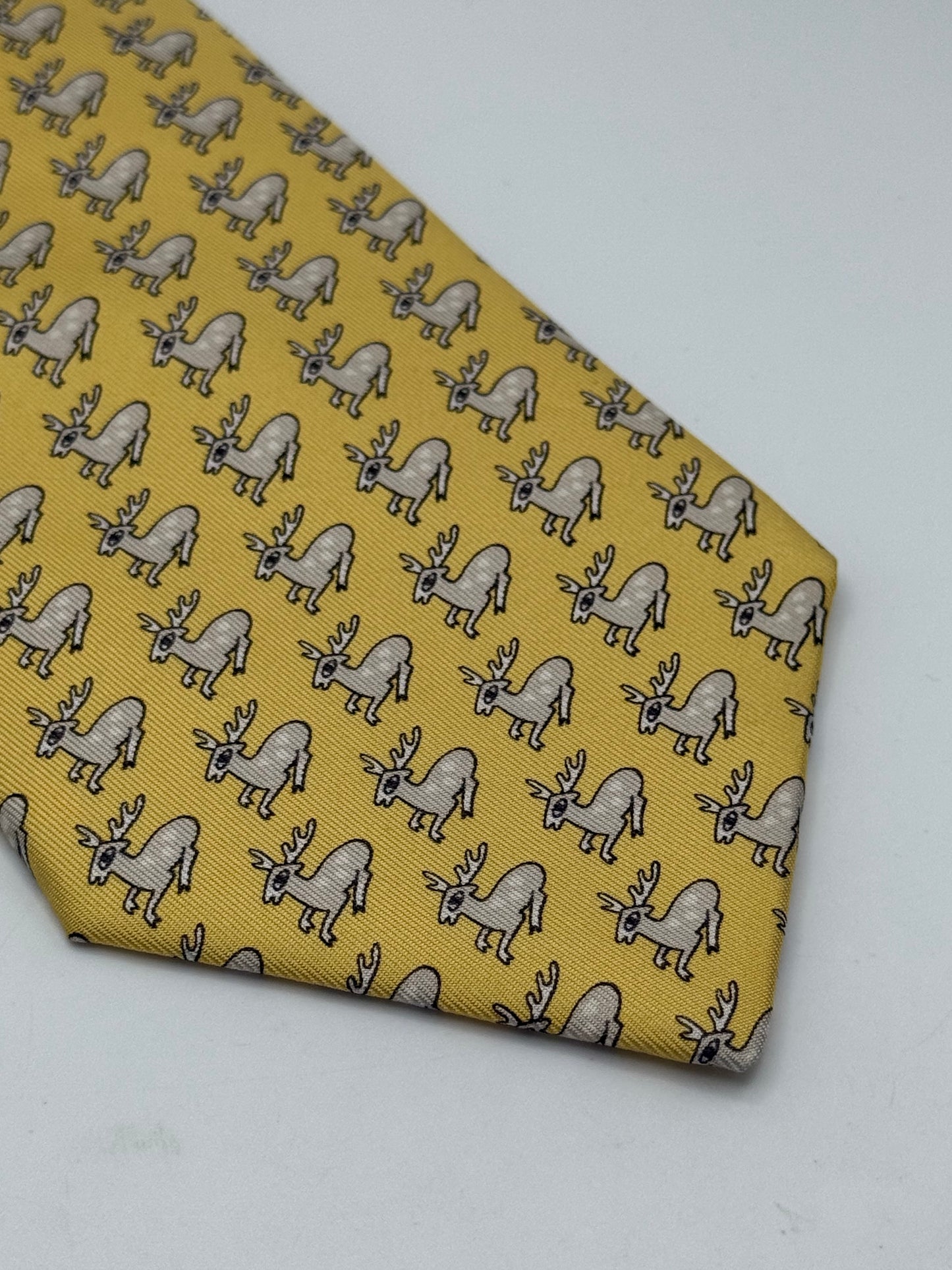 Yellow twill silk tie whit small deer pattern