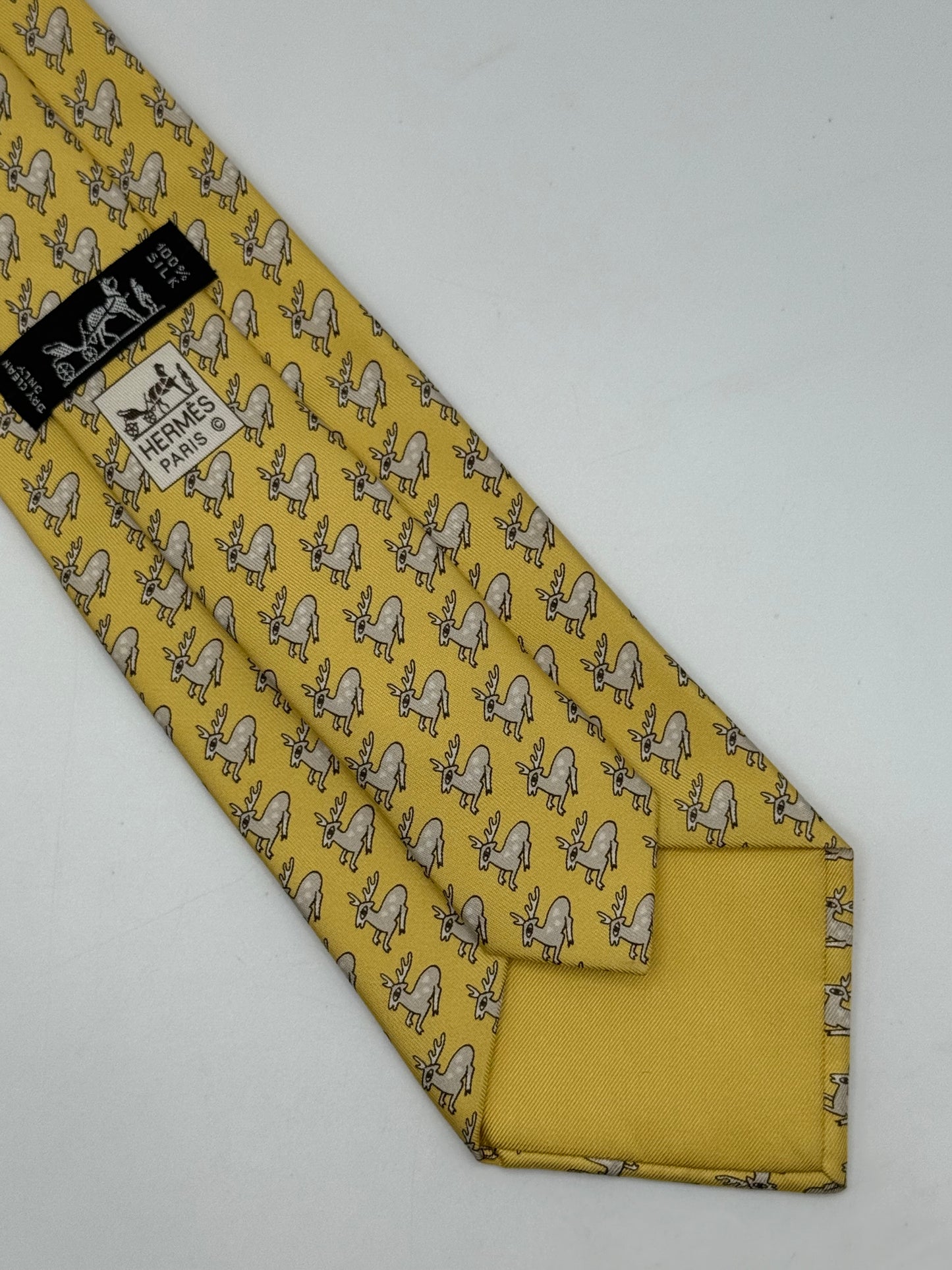 Yellow twill silk tie whit small deer pattern