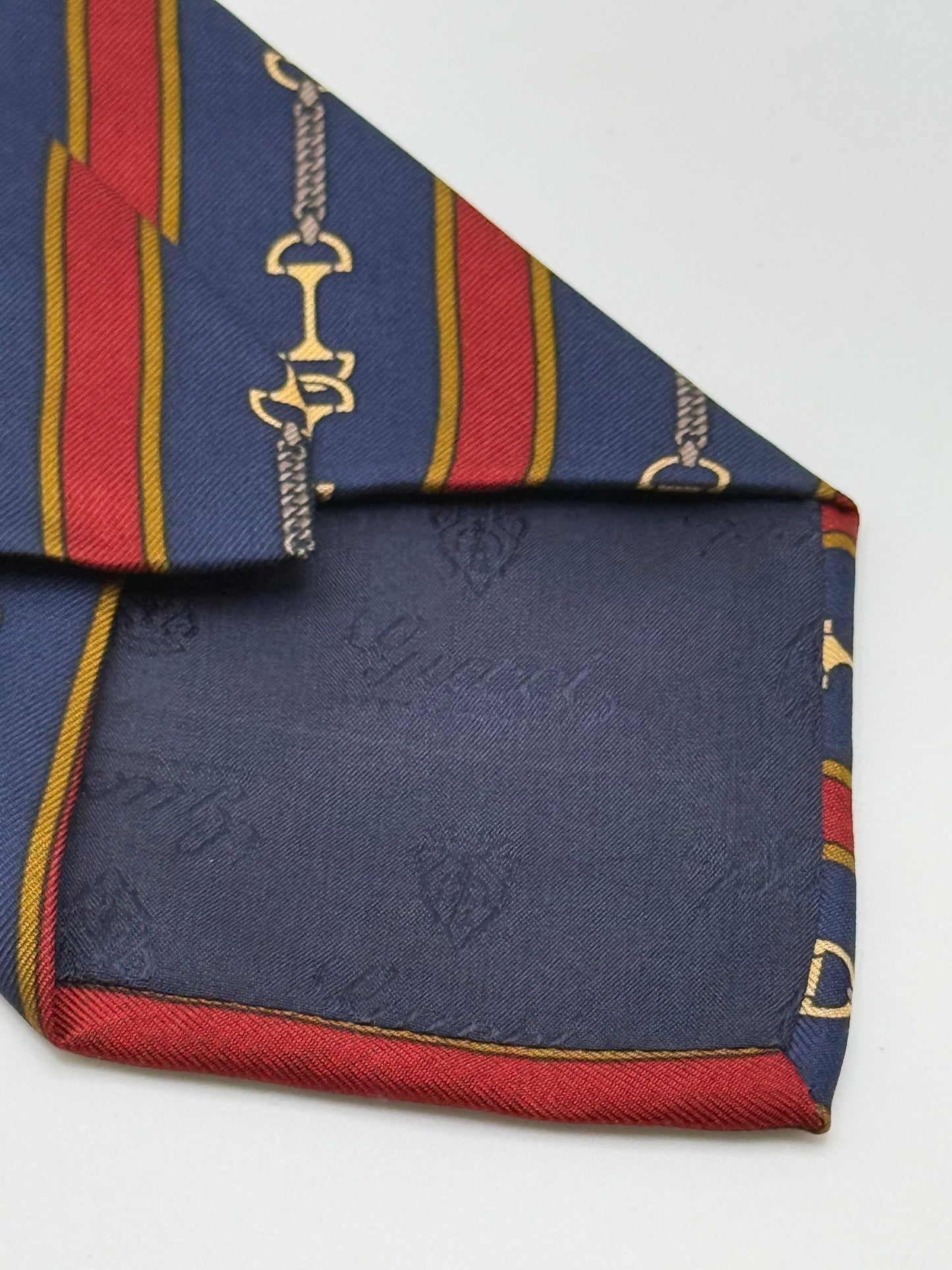 Dark blue silk tie whit gold clamps
