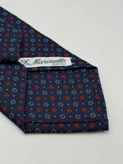 Dark blue twill silk tie whit small flower pattern