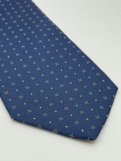 Dark blue twill silk tie whit small flower pattern