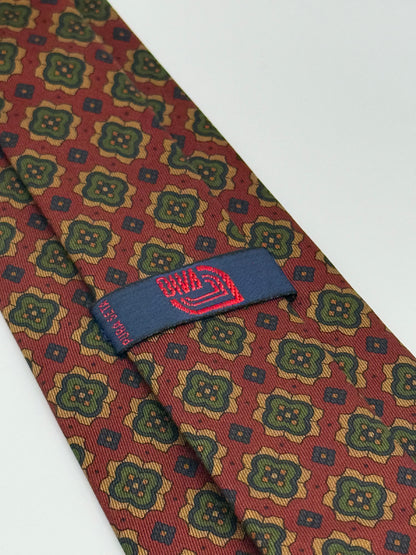 Burgundy silk tie whit geometric pattern