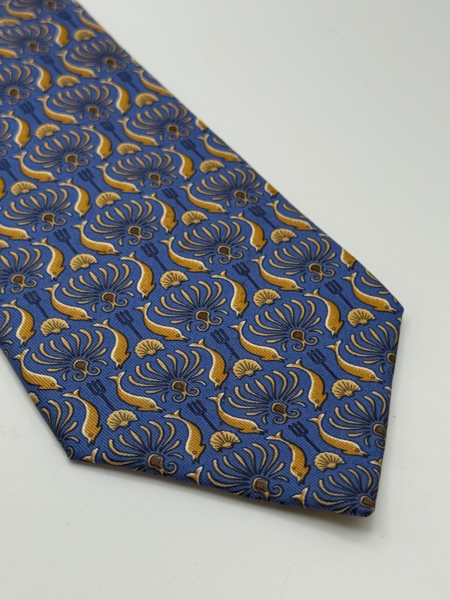 Blue twill silk tie gold dolphin pattern