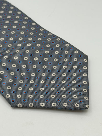 Grey twill silk tie whit small flower pattern