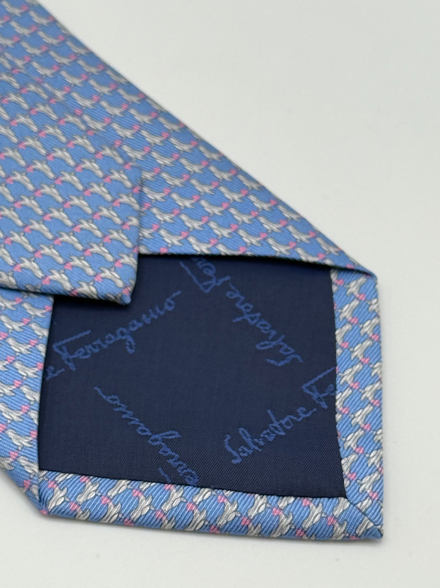 Turquoise silk tie seal pattern