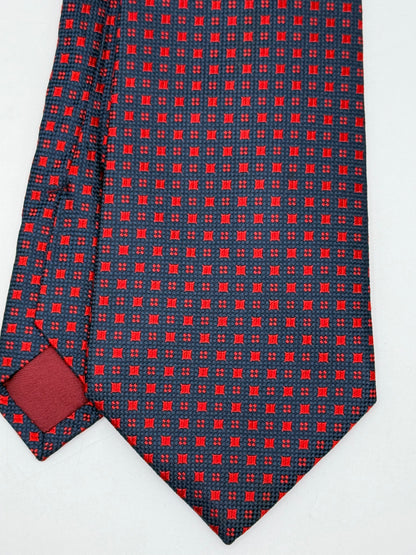 Dark blue jacquard silk tie whit small geometric pattern