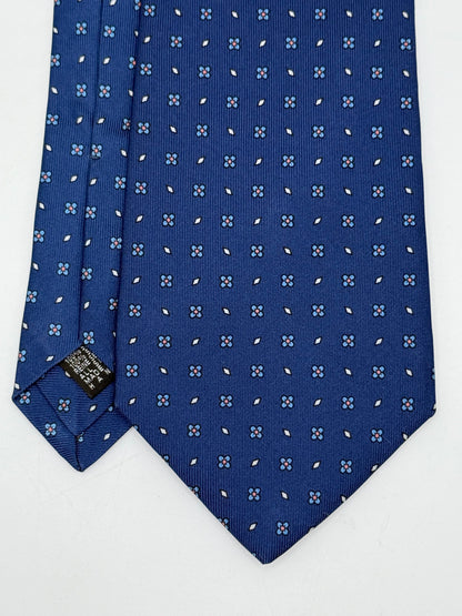 Dark blue twill silk tie whit small flower pattern