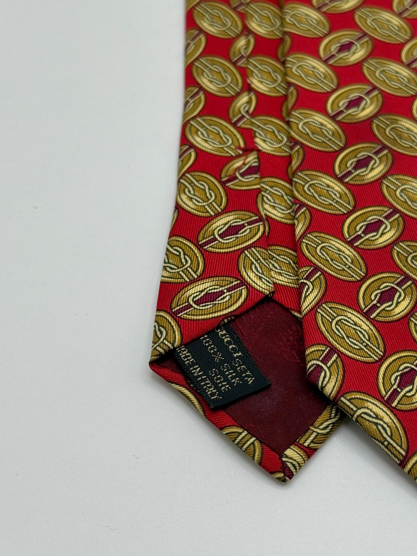 Red twill silk tie gold pattern