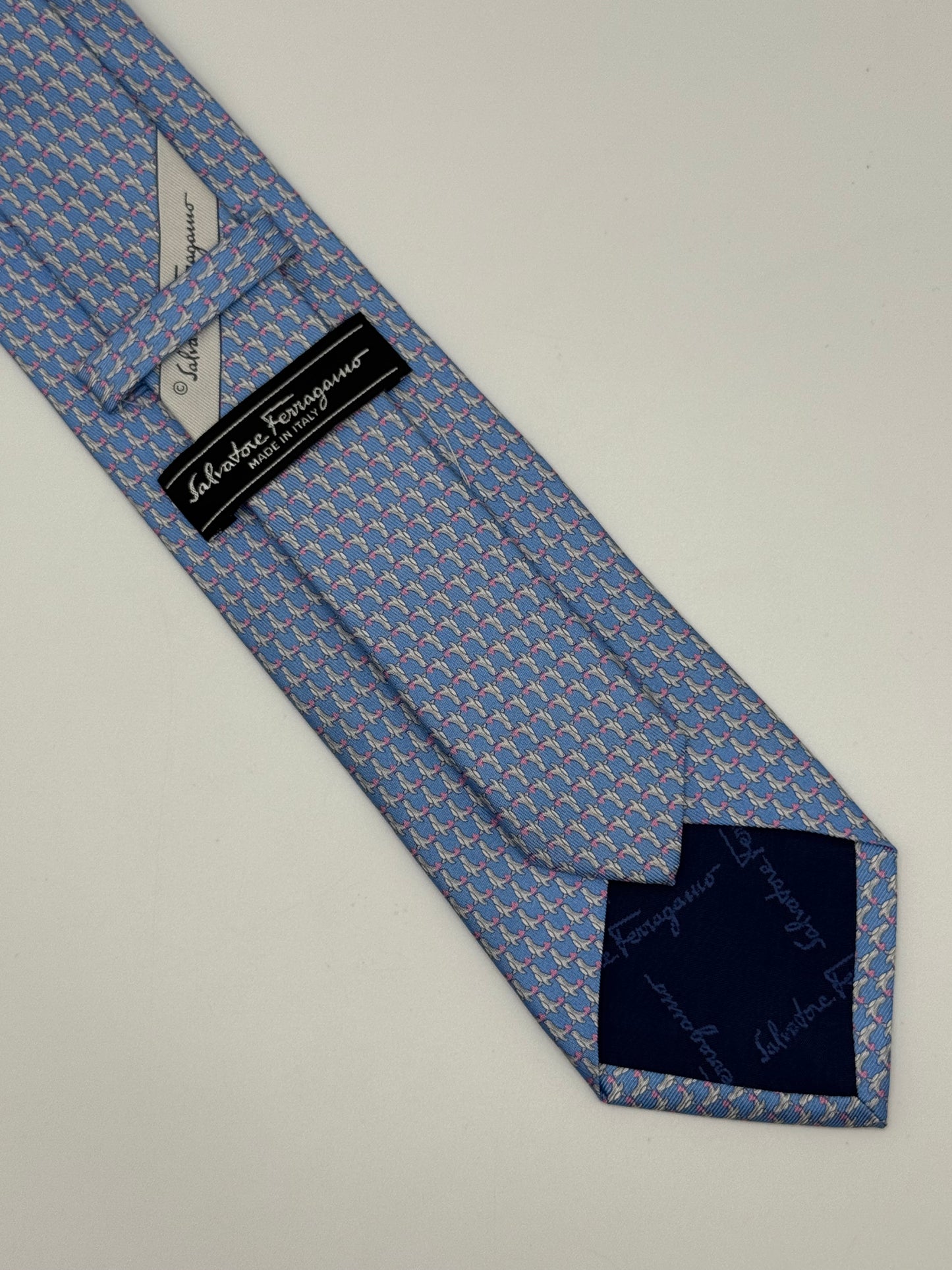 Turquoise silk tie seal pattern