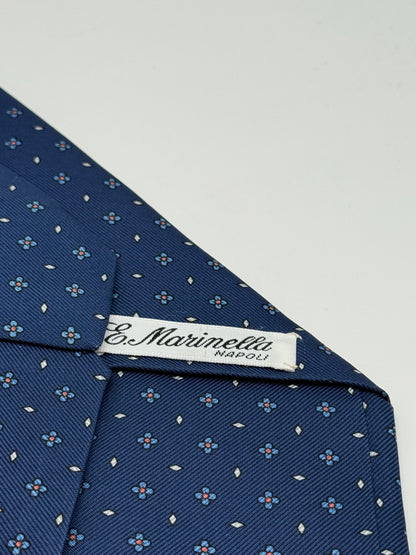 Dark blue twill silk tie whit small flower pattern