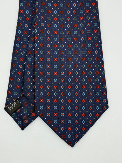 Dark blue twill silk tie whit small flower pattern