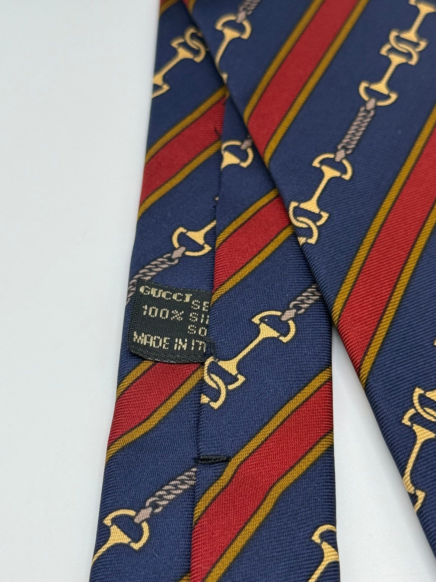 Dark blue silk tie whit gold clamps