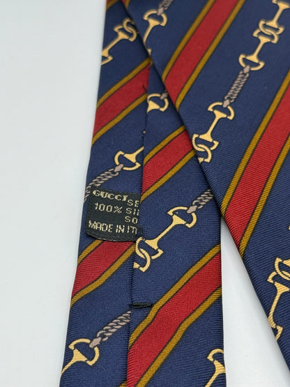 Dark blue silk tie whit gold clamps