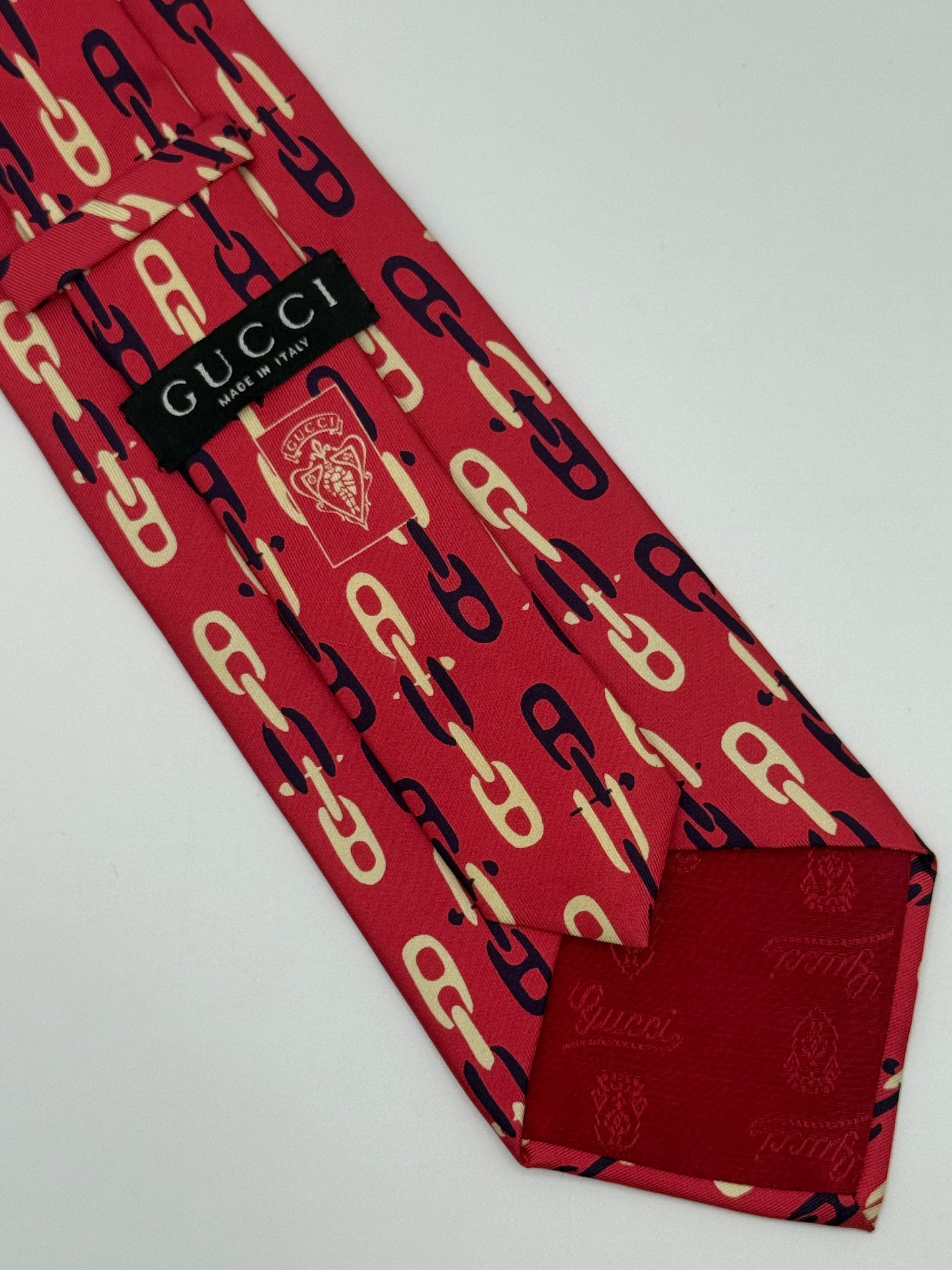 Pink twill silk tie whit clamps pattern