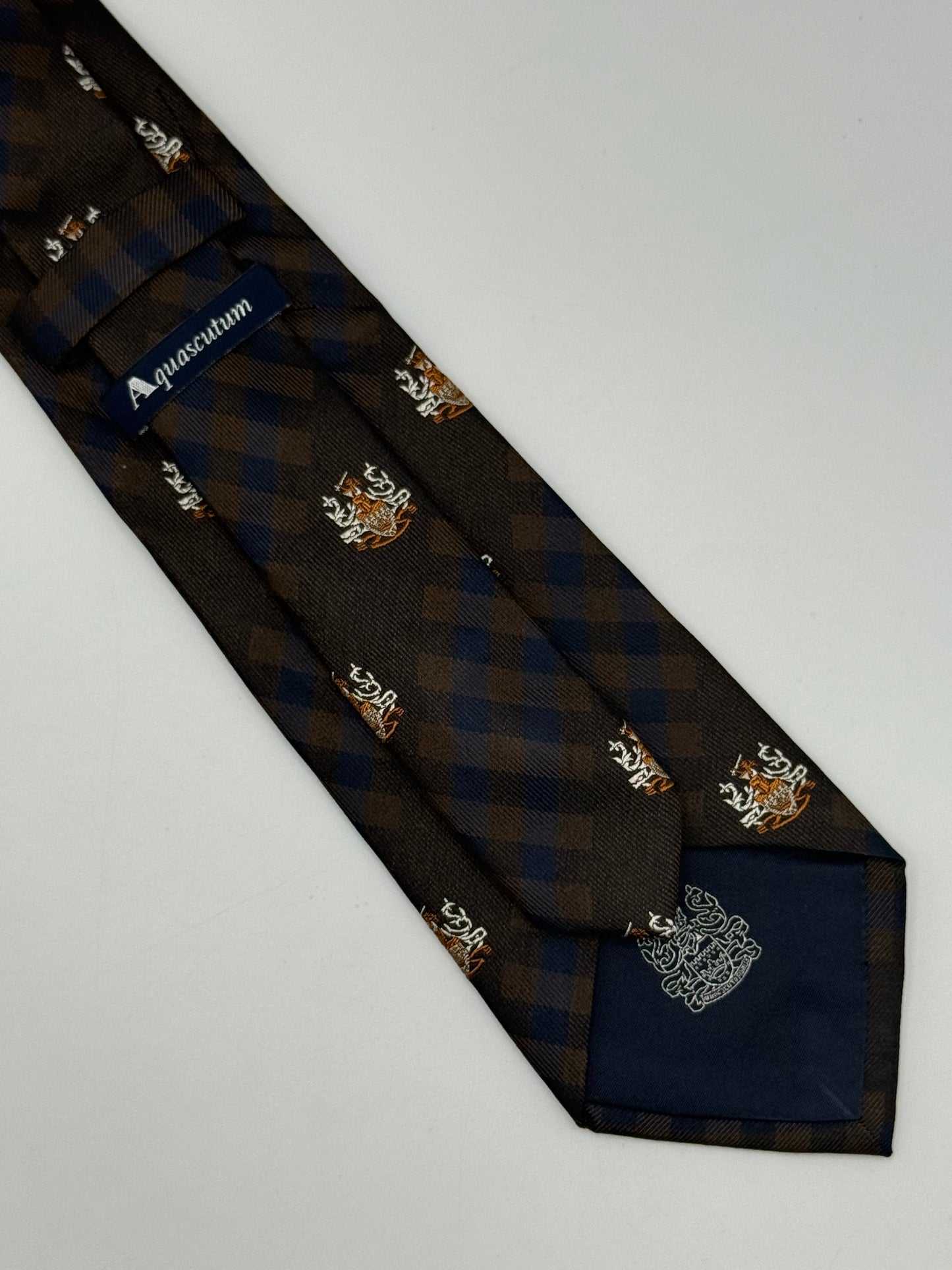 Dark blue and checked silk tie