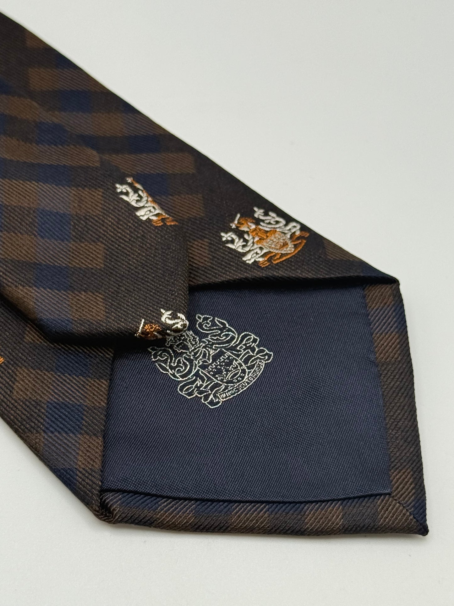 Dark blue and checked silk tie