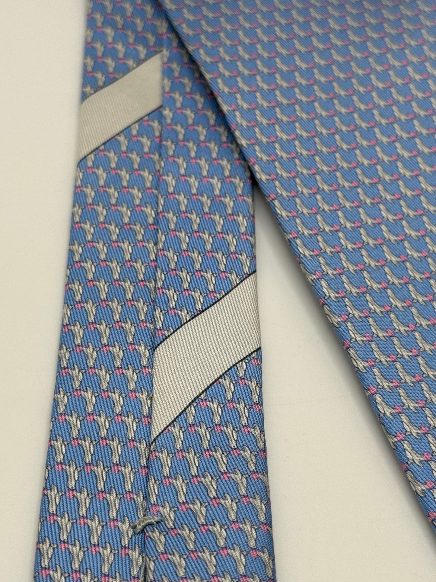 Turquoise silk tie seal pattern