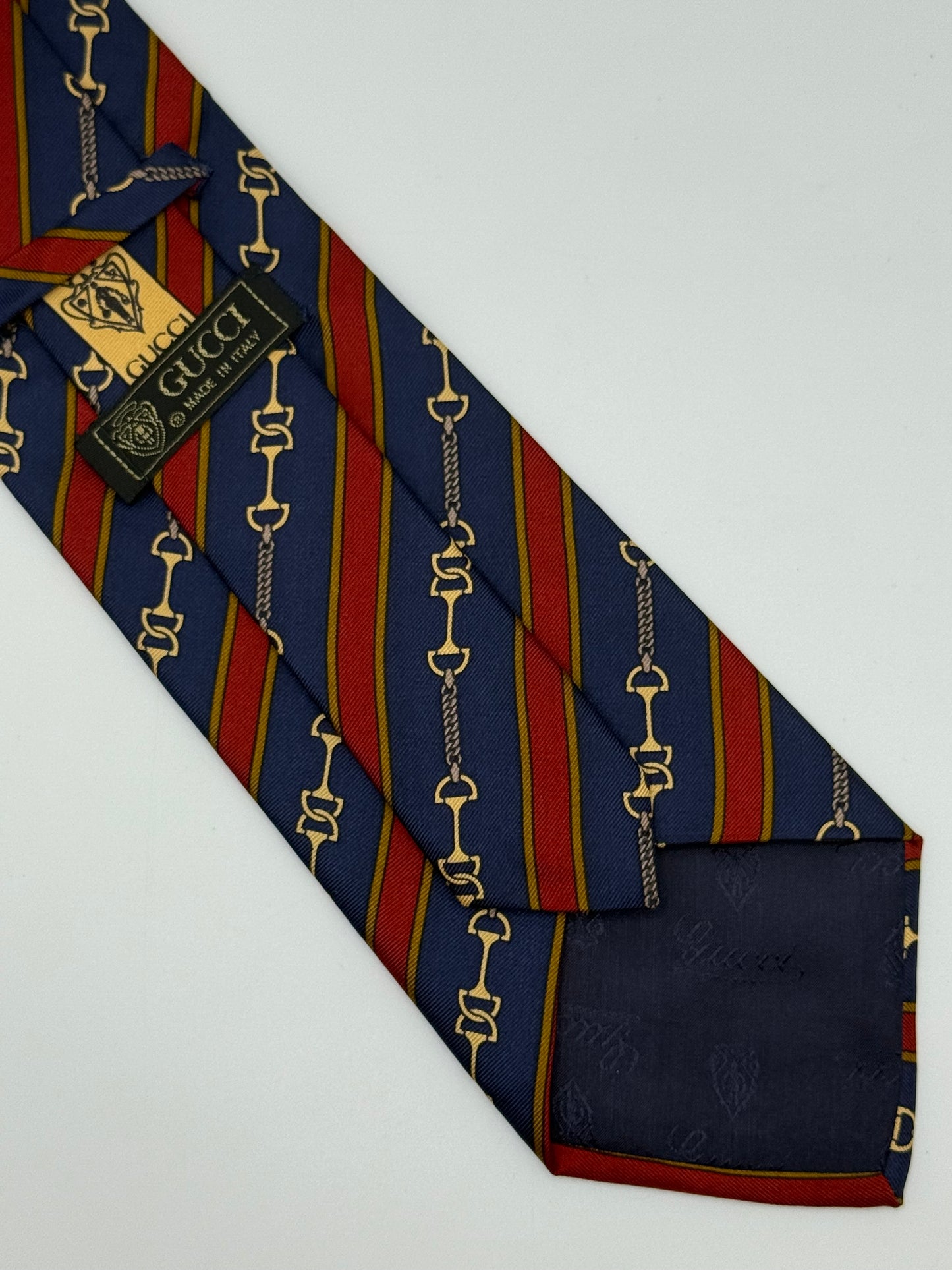 Dark blue silk tie whit gold clamps