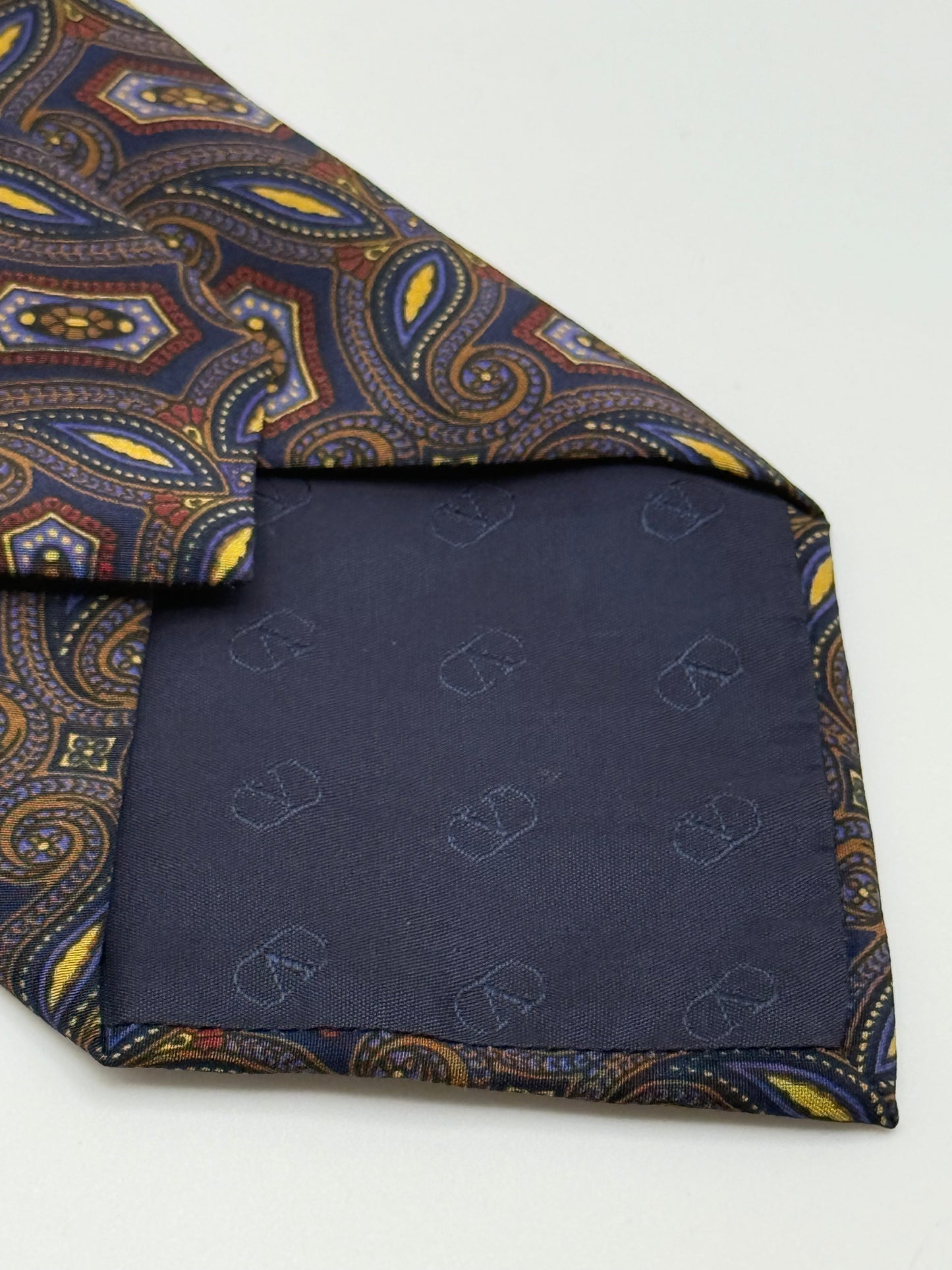 Dark blue silk tie whit geometric and cashmere pattern