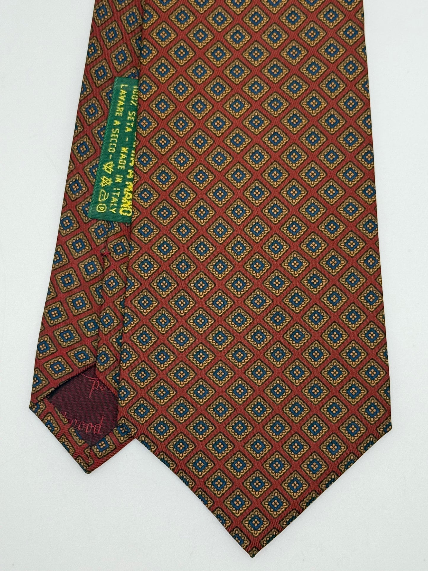 Red silk tie whit geometric pattern