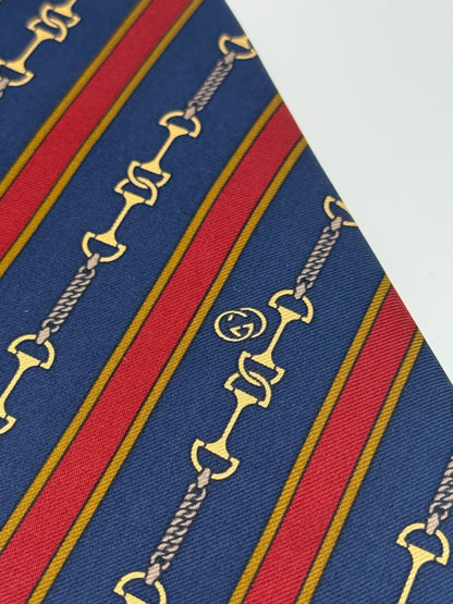 Dark blue silk tie whit gold clamps