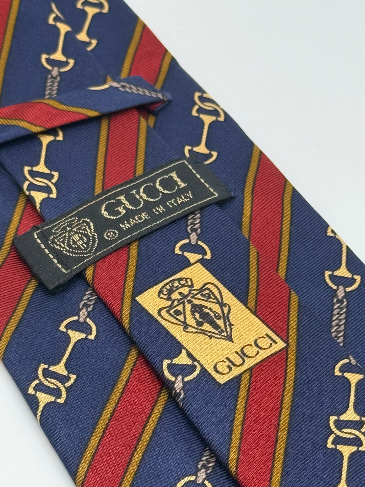 Dark blue silk tie whit gold clamps