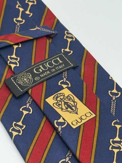 Dark blue silk tie whit gold clamps
