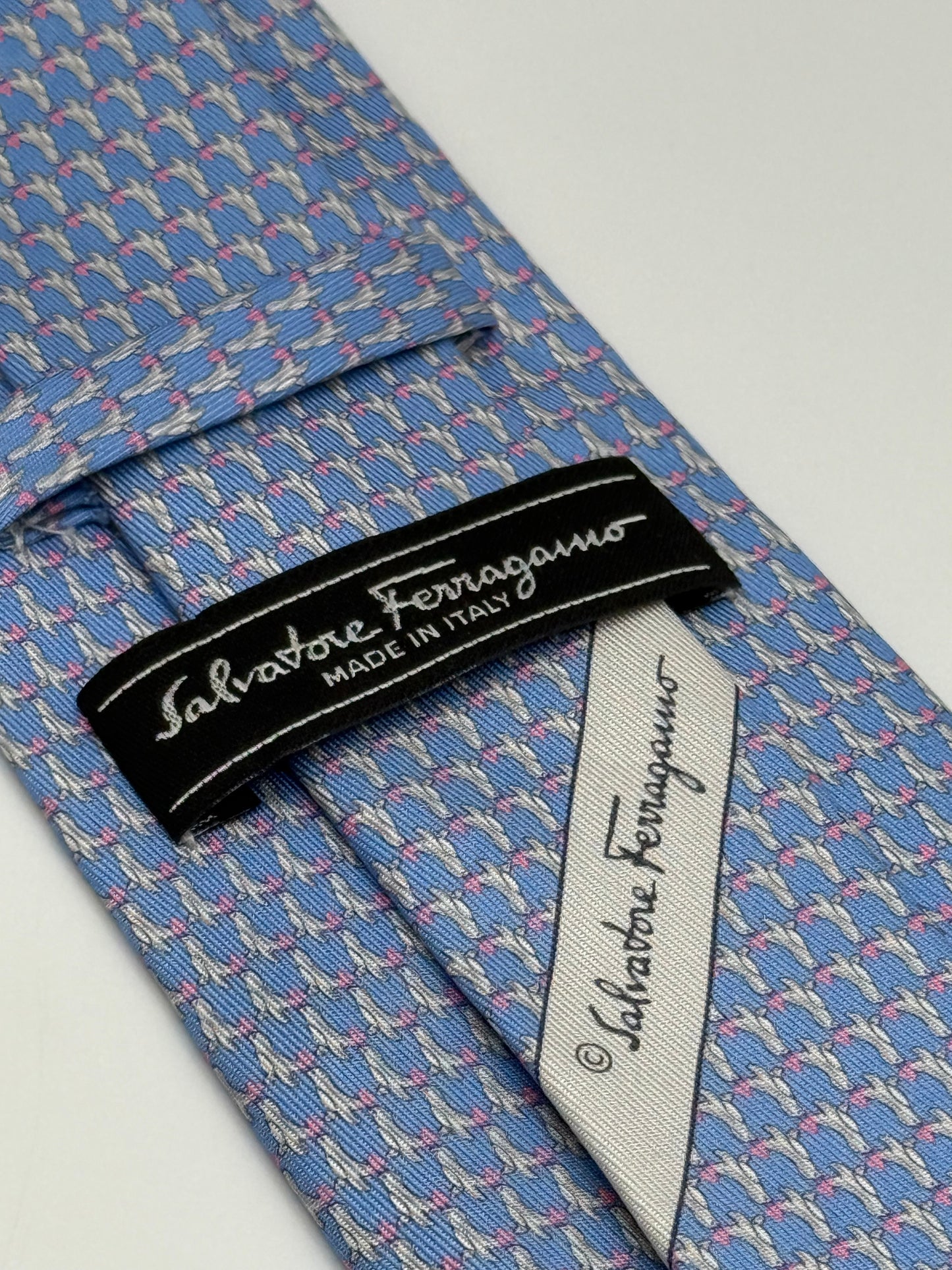 Turquoise silk tie seal pattern