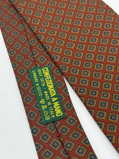Red silk tie whit geometric pattern
