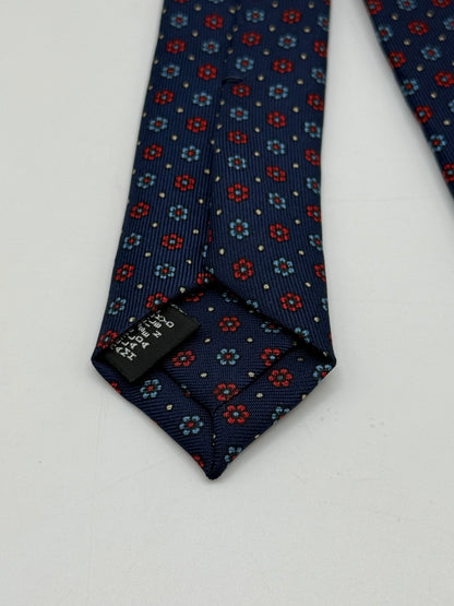 Dark blue twill silk tie whit small flower pattern