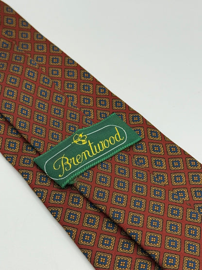 Red silk tie whit geometric pattern