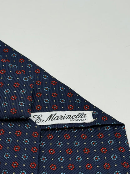 Dark blue twill silk tie whit small flower pattern